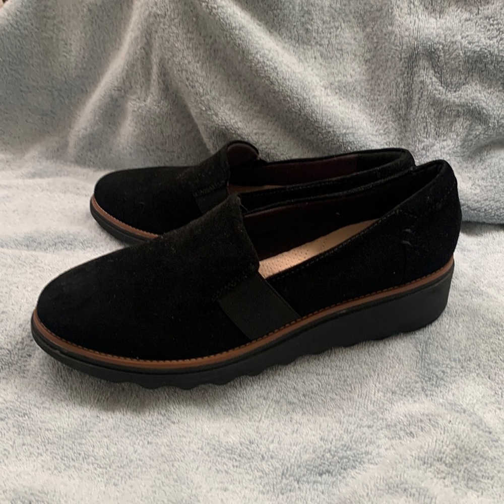 Clark’s black suede loafer